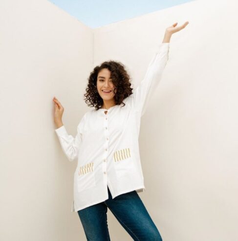 Absolute textured cotton top with geometric embroidery detail on front pockets
