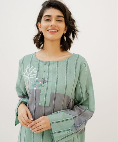 Yarn dyed embroidered pret with button details on placket. Embroidery and handwork detail on front