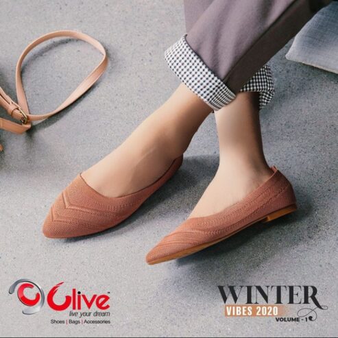 The small slanted heel on Clive’s tan-brown flats